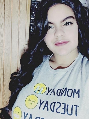 Mya in 2017 with her long, black Wonder Woman wig